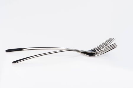 Steel fork isolated on white backgroundの写真素材