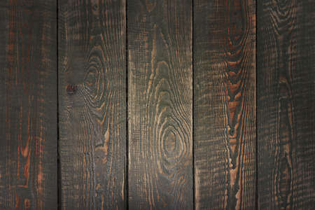 Brown wooden background, textured cutting board.の写真素材