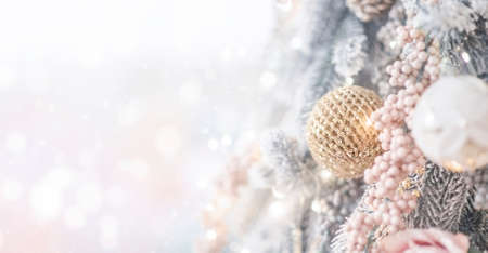 Decorated Christmas tree with lighten bokeh background.の写真素材