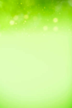 Defocused green bokeh abstract light background.の写真素材