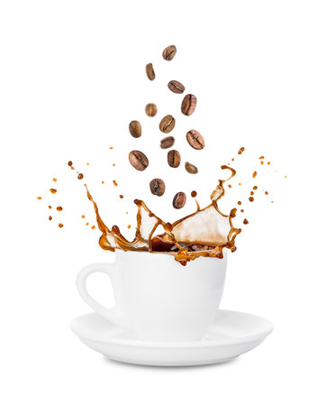 Cup of coffee splash with falling roasted coffee beansの写真素材