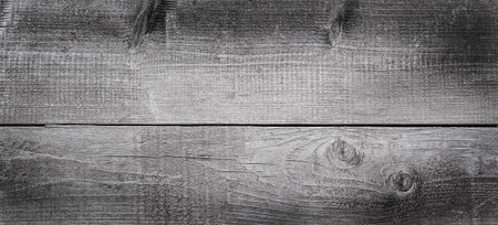 Grey scratched old wooden background.