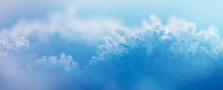Detailed snowflake crystals frozen in snow. Minimal winter texture and cold atmosphere.