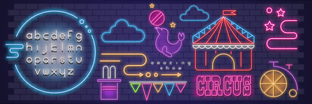 Circus Neon Glowing Signs. Amazing Shou Emblems - Bicycle, Cloud, Seal with Ball, Circus Tent. Bright Signboard in Night Town on Brick Wall. Set Circus Characters Icons. Vector Illustration. Fluorescent Alphabet.のイラスト素材