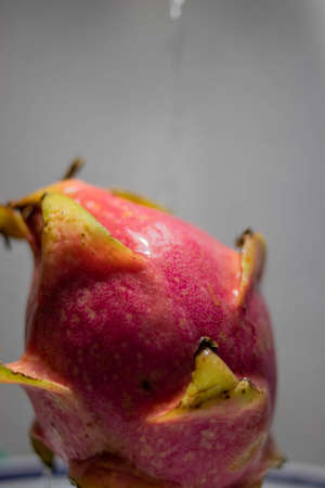 Pitaya, the dragon fruit being cutの写真素材