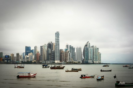 Old boats at Modern City. Panama City view.のeditorial素材