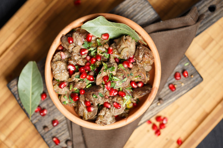 Fried Chicken Liver  with onions and pomegranateの写真素材