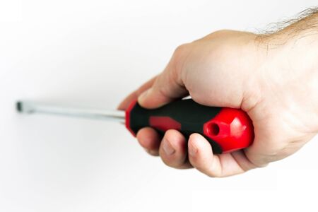 Working with screwdriver in the handの写真素材