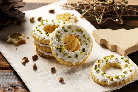 Ring cookies in decorated christmas still life closeupの写真素材