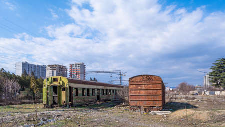Georgia, Tbilisi. Railway junction. Old railway cars. Freight and passenger wagons out of service.の写真素材