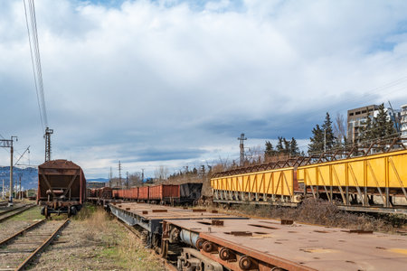 Georgia, Tbilisi. Railway junction. Old railway cars. Freight and passenger wagons out of service.の写真素材