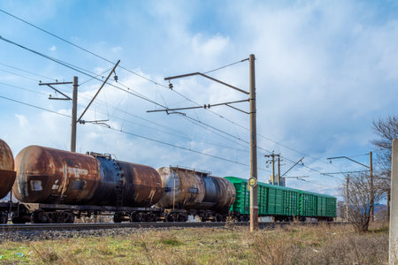 Georgia, Tbilisi. Railway junction. Old railway cars. Freight and passenger wagons out of service.の写真素材