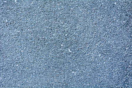 Texture of a concrete wall as a background, close-up.