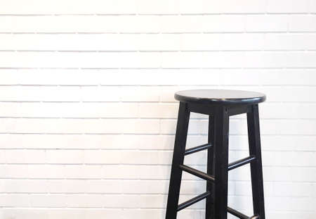 A chair with white background wall