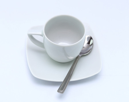 white cup with spoon isolatedの写真素材