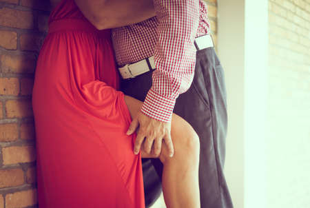 passionate man hugging his woman, body partsの写真素材