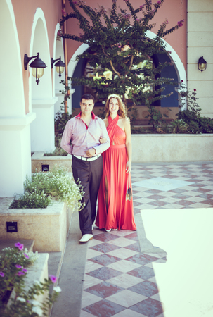 enamored man and woman posing in different placesの写真素材