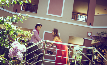 enamored man and woman posing in different placesの写真素材