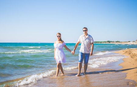 enamored man and woman posing in different placesの写真素材