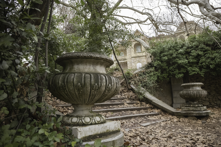 old abandoned park with ruined neoclassical constructionsの写真素材