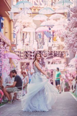 bride in a street with flowersの写真素材