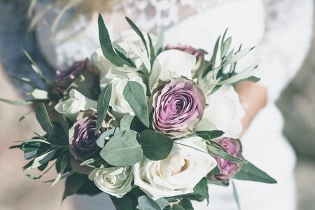 wedding bouquet in brides handsの写真素材