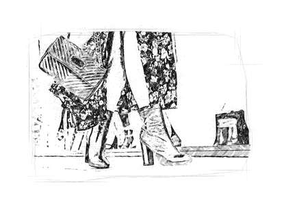 woman legs stepping in front of shopの写真素材
