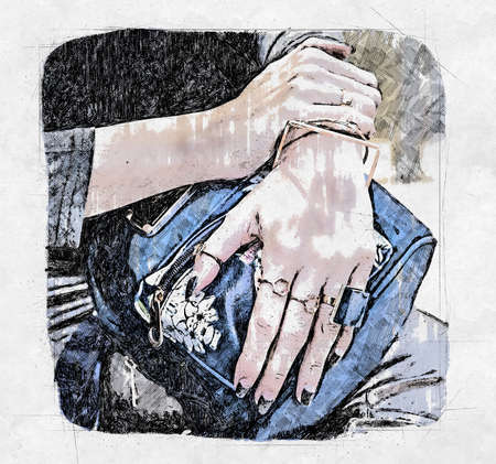woman hands with fau bijou on blue back packの写真素材