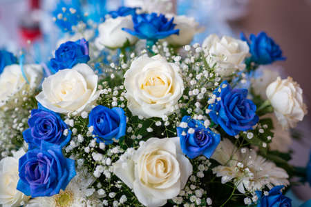 wedding bouquet of blue and pink rosesの写真素材