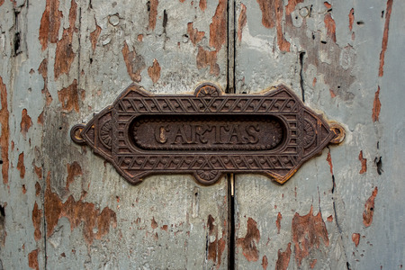 Vintage letterbox slot in the house Antigua Guatemalaの写真素材