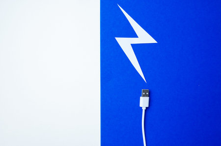 Position Of Electrical Link Beneath Lightning Icon Highlighting Speedy Power Flowの写真素材