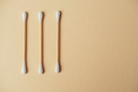 Minimalist Study Capturing Detailed View Of Fibers With Soft Lighting On Beige Surface