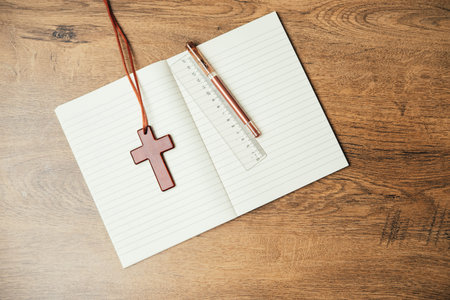 Organized Study Journal. Neatly Arranged Journal With Wooden Cross Marker And Pen For Notes