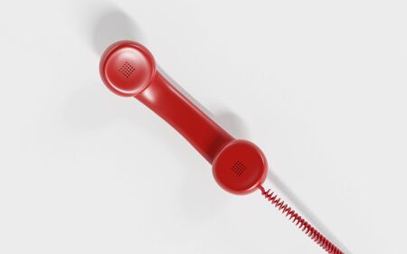 red telephone handset over white background 3d render illustrationの写真素材