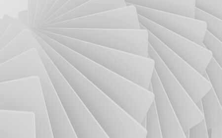 abstract white squares forming spinning spiral swirl in front of white backgroundの写真素材