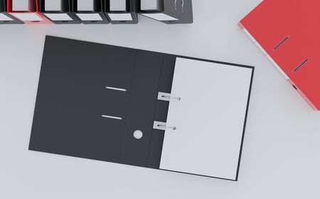 document folders standing on white desk in office loft with copy space and empty sheets for your...