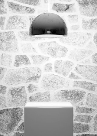 white table and metal lamp on stone wall background modern design interior 3d render illustrationの写真素材