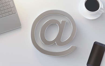 silve at symbol on white desk with notebook, coffee and smart phone 3d render illustrationの写真素材