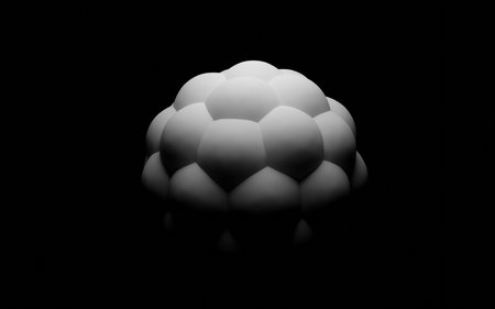 Monochrome geometric sphere with shadows on a black background 3d render illustrationの写真素材