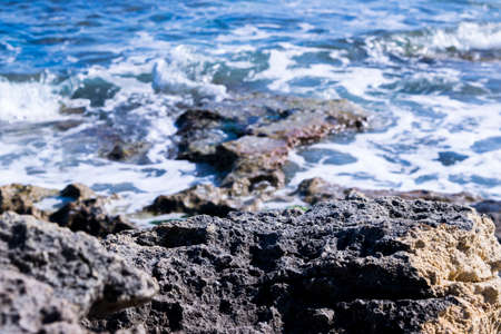 Focused rocks in the blue seaの写真素材