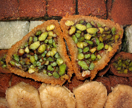 Close-up of various traditional Arabic sweet pastries. の写真素材