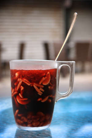 Jallab, a refreshing summer drink, popular during Ramadan.It's made of grape, carob molasses, dates,...