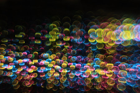 A futuristic multicolored bokeh ray.の写真素材