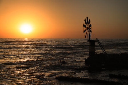Windmill for extracting sea water for saltmarshes in the coastal city of Anfeh, Lebanon.