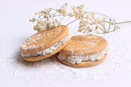 Biscuits filled with Turkish delights on white.の写真素材