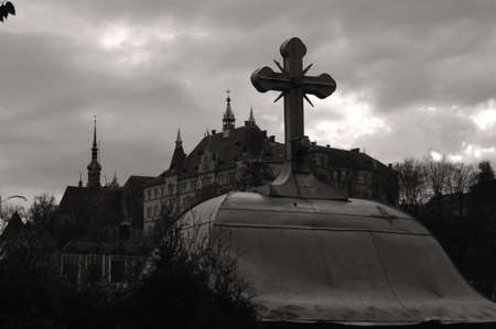 Orthodox Christian Cross in front of castle in Romaniaのeditorial素材