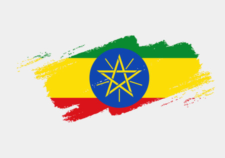 Artistic grunge brush flag of Ethiopia isolated on white background. Elegant texture of national flagのイラスト素材
