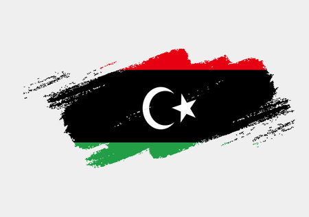 Artistic grunge brush flag of Libya isolated on white background. Elegant texture of national flagのイラスト素材