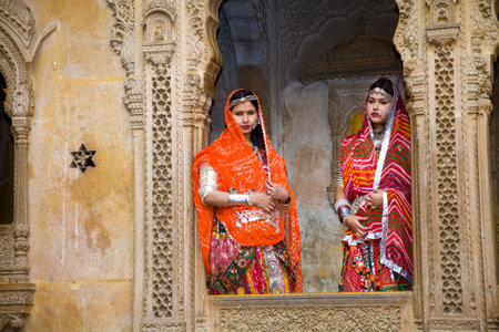 Jaisalmer, India - 2015, January 7 : Two female Indian tourists dressed up in traditional clothing...