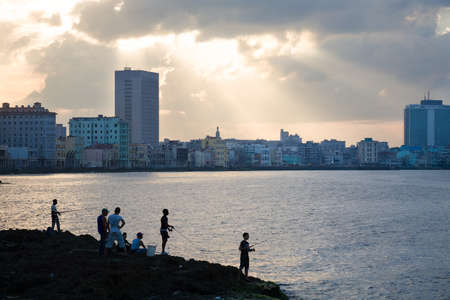 The Malecon or waterfront with skyline of the city of Havana in Cubaの写真素材